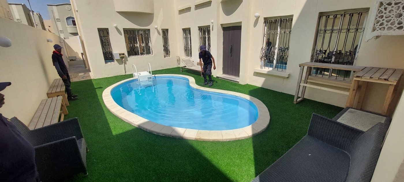 Resort pool with palm trees