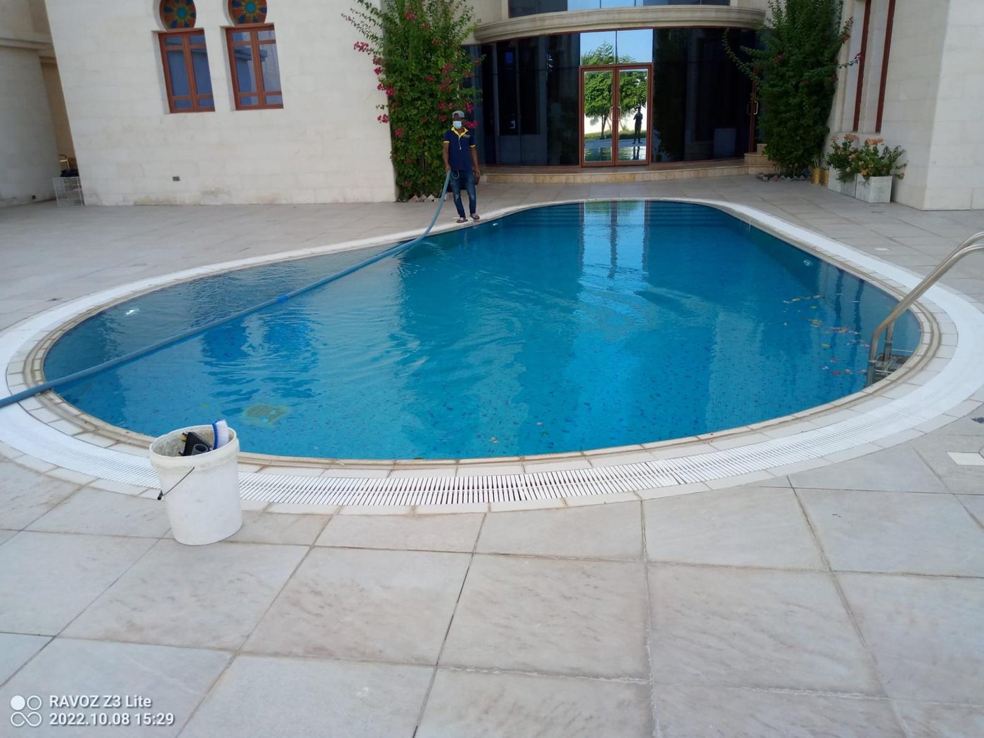 Pool maintenance — clean blue water